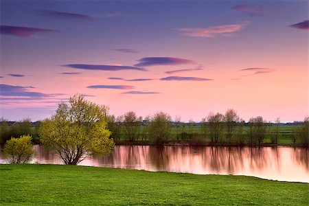 simsearch:400-06875459,k - colorful sunset over calm river, Gelderland, Netherlands Stock Photo - Budget Royalty-Free & Subscription, Code: 400-07170901