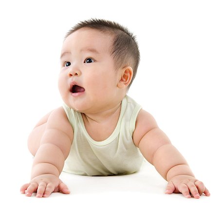 simsearch:400-07173561,k - Happy Asian baby boy looking up and smiling. Full body crawling on floor, isolated on white background. Foto de stock - Royalty-Free Super Valor e Assinatura, Número: 400-07171463