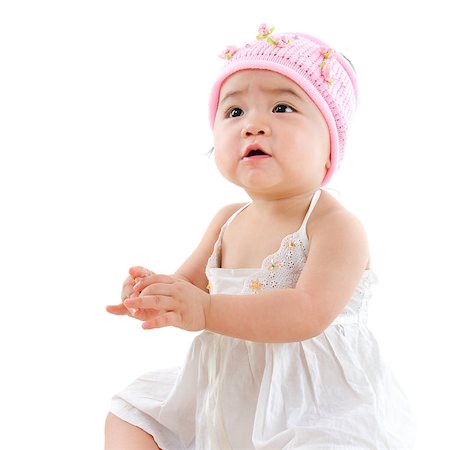 simsearch:400-05739745,k - Portrait of cute Asian baby girl looking up,  isolated on white background Stock Photo - Budget Royalty-Free & Subscription, Code: 400-07171479