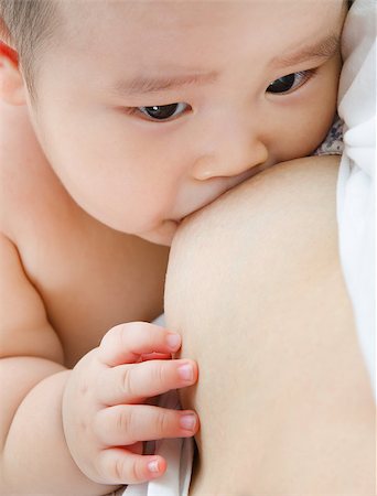simsearch:400-05174328,k - Close up Asian mother breast feeding baby boy.  Mother and baby Photographie de stock - Aubaine LD & Abonnement, Code: 400-07171485