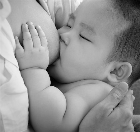 simsearch:695-05778625,k - Mother and baby. Close up Asian mother breastfeeding baby boy in black and white tone. Stock Photo - Budget Royalty-Free & Subscription, Code: 400-07171486