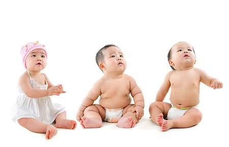 simsearch:400-06077328,k - Group of Asian babies looking up, sitting isolated on white background Foto de stock - Super Valor sin royalties y Suscripción, Código: 400-07171482