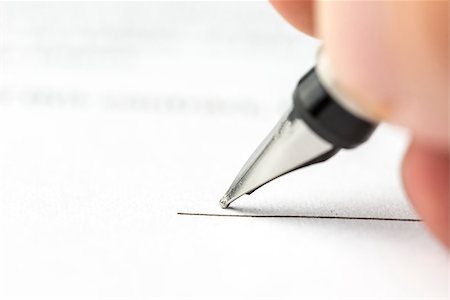 Macro shot of signing contract with ink pen. Stockbilder - Microstock & Abonnement, Bildnummer: 400-07171587