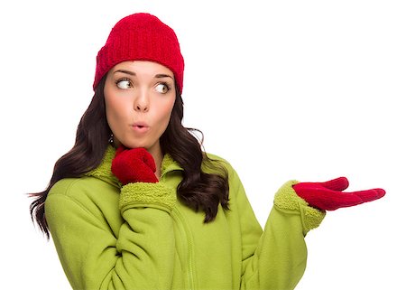 simsearch:400-06462603,k - Beautiful Mixed Race Woman Wearing Winter Hat and Gloves Isolated on a White Background Gesturing with Her Hand to the Side. Stock Photo - Budget Royalty-Free & Subscription, Code: 400-07172130