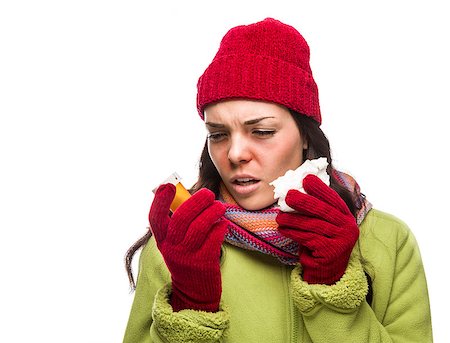 female coughing - Sick Mixed Race Woman Wearing Winter Hat and Gloves Blowing Her Sore Nose and Holding Empty Medicine Bottle Isolated on White. Stock Photo - Budget Royalty-Free & Subscription, Code: 400-07172150