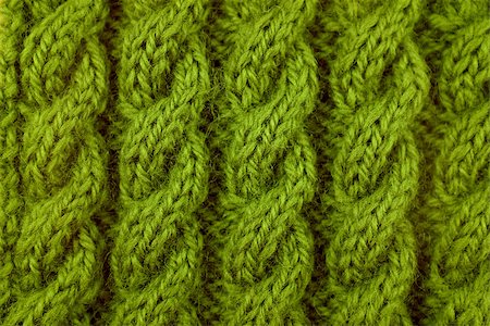 fiber cable - Closeup of green coiled rope cable knitting stitch Stock Photo - Budget Royalty-Free & Subscription, Code: 400-07172179