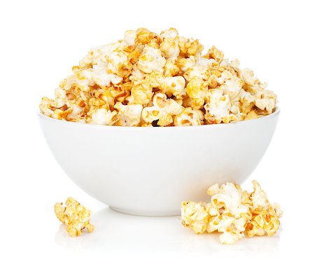 Bowl with popcorn. Isolated on white background Foto de stock - Super Valor sin royalties y Suscripción, Código: 400-07172261