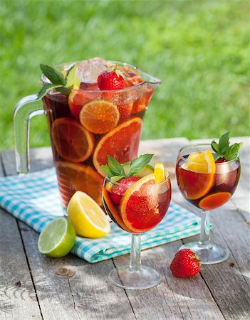 summer cocktails jug - Refreshing fruit sangria (punch) on wood table Stock Photo - Budget Royalty-Free & Subscription, Code: 400-07172276