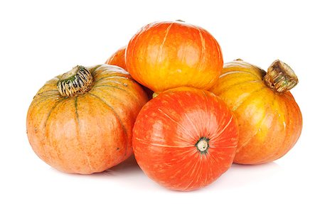 simsearch:400-05714074,k - Ripe small pumpkins. Isolated on white background Photographie de stock - Aubaine LD & Abonnement, Code: 400-07172417