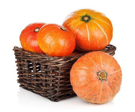 simsearch:400-05714074,k - Ripe small pumpkins in basket. Isolated on white background Foto de stock - Royalty-Free Super Valor e Assinatura, Número: 400-07172418