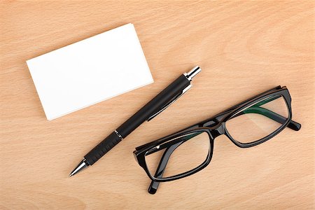 simsearch:400-06462302,k - Blank business cards with pen and glasses on wooden office table Stock Photo - Budget Royalty-Free & Subscription, Code: 400-07172439
