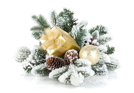 simsearch:400-07450793,k - Gift box and christmas decor on snowy fir tree. Isolated on white background Stock Photo - Budget Royalty-Free & Subscription, Code: 400-07172488