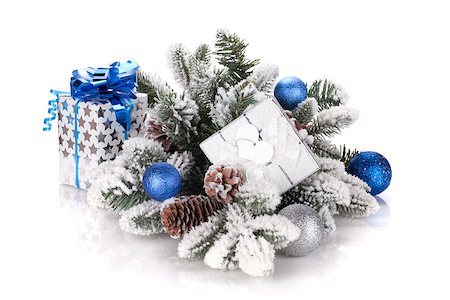 simsearch:400-07450793,k - Gift box and christmas decor on snowy fir tree. Isolated on white background Stock Photo - Budget Royalty-Free & Subscription, Code: 400-07172502