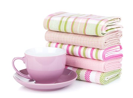 simsearch:400-04799995,k - Kitchen towels and coffee cup. Isolated on white background Stock Photo - Budget Royalty-Free & Subscription, Code: 400-07172520