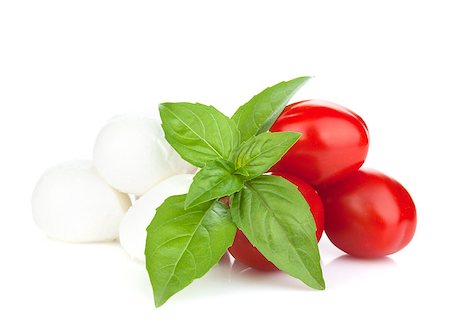 simsearch:400-07172265,k - Mozzarella cheese with cherry tomatoes and basil. Isolated on white background Foto de stock - Royalty-Free Super Valor e Assinatura, Número: 400-07172620