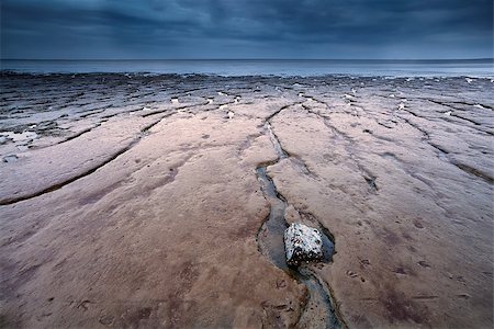 mud texture at low tide on North sea, Moddergat, Friesland Stock Photo - Budget Royalty-Free & Subscription, Code: 400-07173518