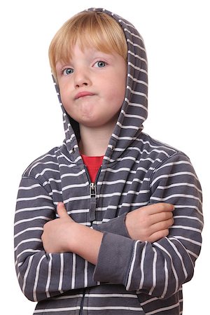 Portrait of a young offended boy on white Background Stock Photo - Budget Royalty-Free & Subscription, Code: 400-07173705