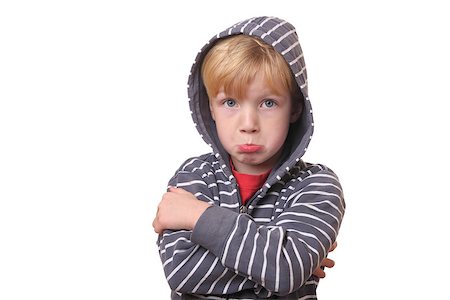 simsearch:400-06561568,k - Portrait of a young offended boy on white Background Photographie de stock - Aubaine LD & Abonnement, Code: 400-07173707