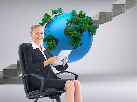 step stream - Composite image of blonde businesswoman sitting on swivel chair with tablet Stock Photo - Budget Royalty-Free & Subscription, Code: 400-07184128