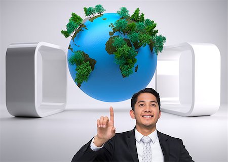 Composite image of smiling asian businessman pointing Stock Photo - Budget Royalty-Free & Subscription, Code: 400-07184577
