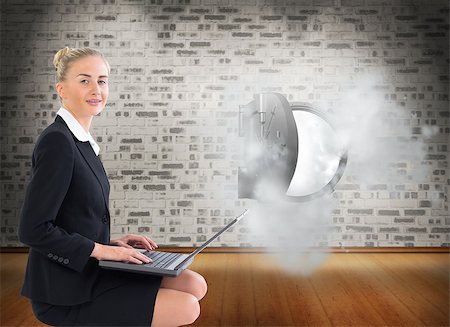 smoking room - Composite image of blonde businesswoman using laptop Stock Photo - Budget Royalty-Free & Subscription, Code: 400-07185692