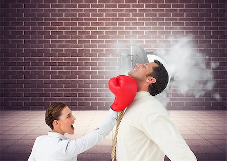 Composite image of businesswoman hitting a businessman with boxing gloves Stock Photo - Budget Royalty-Free & Subscription, Code: 400-07186168