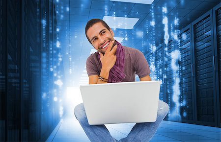 simsearch:400-06869489,k - Composite image of thinking man sitting on floor using laptop and smiling Photographie de stock - Aubaine LD & Abonnement, Code: 400-07186325