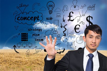 simsearch:400-07190169,k - Composite image of unsmiling businessman holding and pointing Stock Photo - Budget Royalty-Free & Subscription, Code: 400-07187067