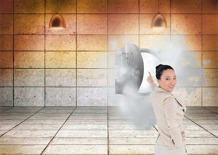 Composite image of smiling asian businesswoman pointing Stock Photo - Budget Royalty-Free & Subscription, Code: 400-07187146