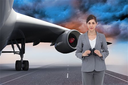 Composite image of young businesswoman with binoculars Stock Photo - Budget Royalty-Free & Subscription, Code: 400-07187869