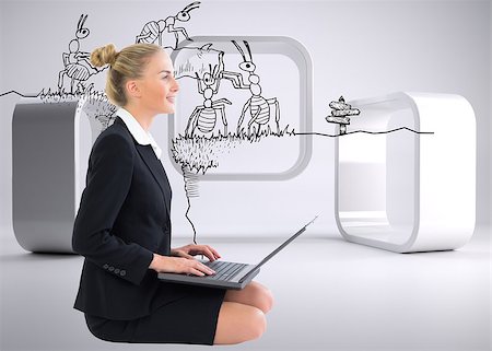 Composite image of blonde businesswoman using laptop Stock Photo - Budget Royalty-Free & Subscription, Code: 400-07187931