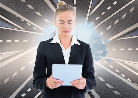 Composite image of blonde businesswoman holding tablet Stock Photo - Budget Royalty-Free & Subscription, Code: 400-07188273
