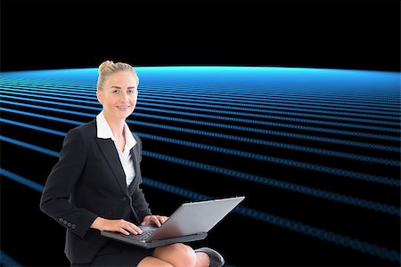 simsearch:400-07188518,k - Composite image of blonde businesswoman using laptop Foto de stock - Royalty-Free Super Valor e Assinatura, Número: 400-07188449