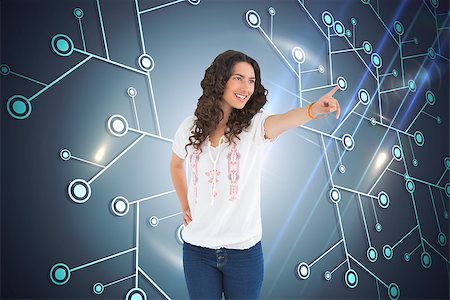 simsearch:400-07189587,k - Composite image of cheerful attractive brunette wearing casual clothes pointing Stockbilder - Microstock & Abonnement, Bildnummer: 400-07188576