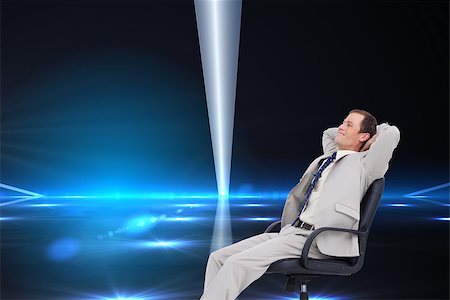 stylish businessman leaning - Composite image of side view of businessman leaning back in his chair Foto de stock - Super Valor sin royalties y Suscripción, Código: 400-07188807