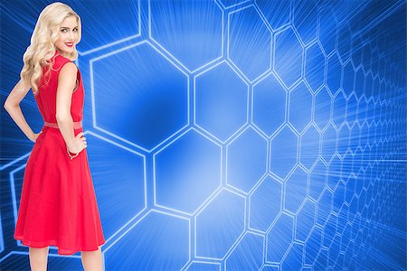 pattern digital tech cute - Composite image of smiling attractive blonde standing hands on hips Stock Photo - Budget Royalty-Free & Subscription, Code: 400-07188938