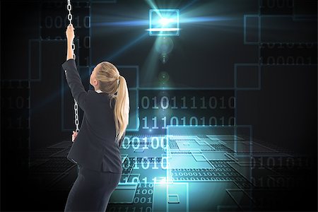 simsearch:400-07224720,k - Composite image of blonde businesswoman pulling a chain Stock Photo - Budget Royalty-Free & Subscription, Code: 400-07188978