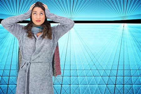 simsearch:400-07189587,k - Composite image of anxious pretty brunette wearing winter clothes posing Stockbilder - Microstock & Abonnement, Bildnummer: 400-07189171