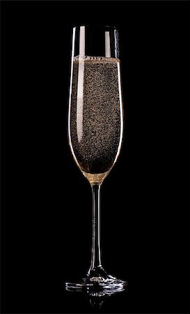 Glass of champagne with bubbles on black background Stock Photo - Budget Royalty-Free & Subscription, Code: 400-07180137