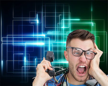 Composite image of frustrated computer engineer screaming while on call on black background with glowing lines Stock Photo - Budget Royalty-Free & Subscription, Code: 400-07180395
