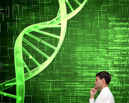 dna and businessman - Composite image of thoughtful young businessman looking at dna spiral on green matrix background Stock Photo - Budget Royalty-Free & Subscription, Code: 400-07180460