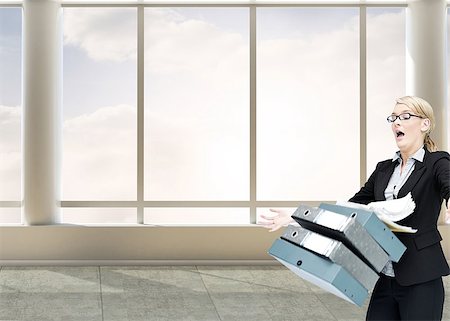 simsearch:400-06802290,k - Composite image of businesswoman dropping many folders in bright 3d room with windows Stock Photo - Budget Royalty-Free & Subscription, Code: 400-07180529