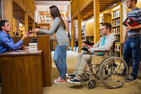 disabled female student - Students with handicapped man in row at the counter in college library Stock Photo - Budget Royalty-Free & Subscription, Code: 400-07180796