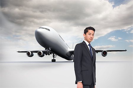 simsearch:400-05188363,k - Composite image of frowning businessman looking at camera Stock Photo - Budget Royalty-Free & Subscription, Code: 400-07190095
