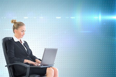 simsearch:400-07188518,k - Composite image of blonde businesswoman sitting on swivel chair with laptop Foto de stock - Royalty-Free Super Valor e Assinatura, Número: 400-07190853