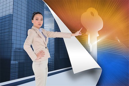 simsearch:400-07227450,k - Composite image of unsmiling asian businesswoman pointing Stock Photo - Budget Royalty-Free & Subscription, Code: 400-07190900