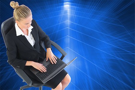 simsearch:400-07188518,k - Composite image of blonde businesswoman sitting on swivel chair with laptop Foto de stock - Royalty-Free Super Valor e Assinatura, Número: 400-07191053