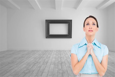 prayer room - Composite image of troubled young businesswoman praying while posing Stock Photo - Budget Royalty-Free & Subscription, Code: 400-07191081