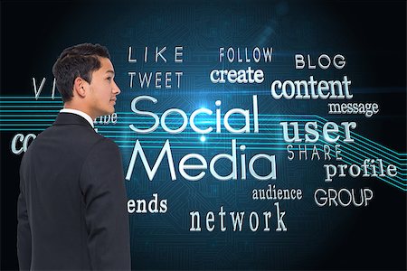 social media likes - Composite image of serious asian businessman Stock Photo - Budget Royalty-Free & Subscription, Code: 400-07191117