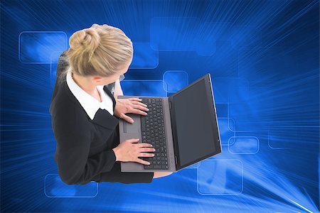 simsearch:400-07188518,k - Composite image of blonde businesswoman using laptop Foto de stock - Royalty-Free Super Valor e Assinatura, Número: 400-07191362